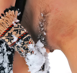 A Christmas girl naked in the snow