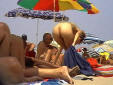 behind her bum on beach