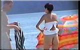 girl undressing at nudist beach movie